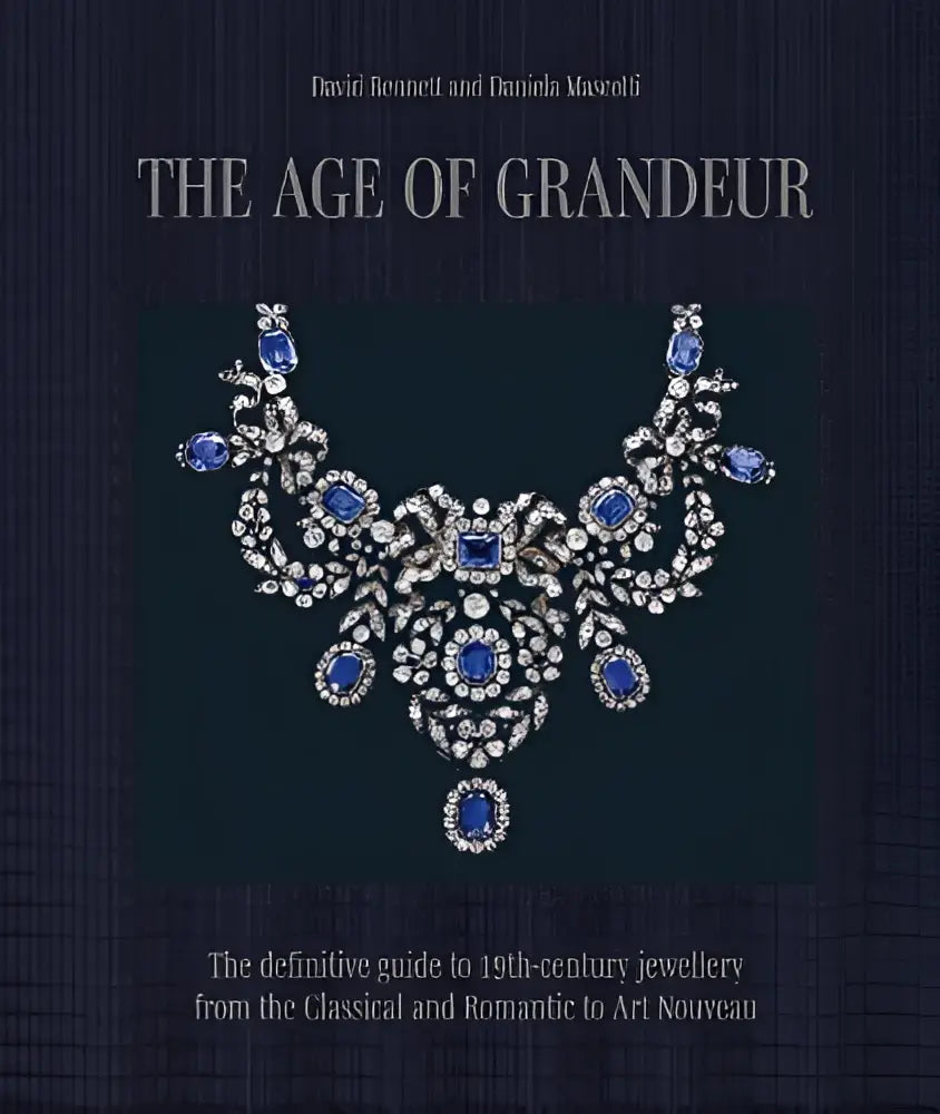 Een sierlijke zilveren ketting met blauwe saffieren en diamanten in een bloemmotief uit de definitieve gids