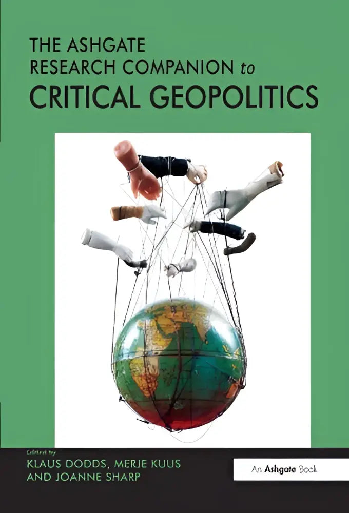 De ashgate research companion to critical geopolitics hardcover boek met groene omslag en afbeelding van handen die een globe manipuleren