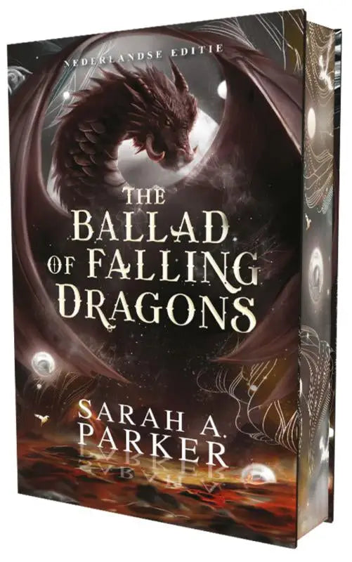 The ballad of falling dragons boek met donker drakenillustratie en witte letters in een ornamentaal ontwerp