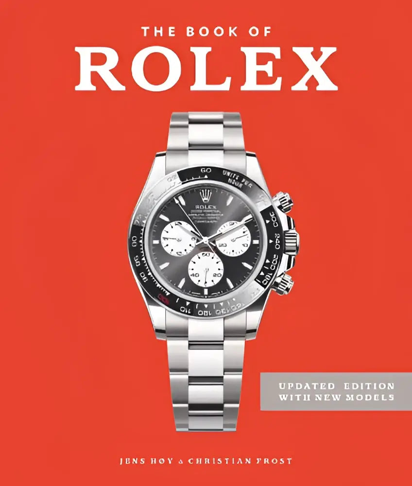 Zilveren roestvrijstalen rolex daytona met zwarte wijzerplaat en witte subdials uit the book