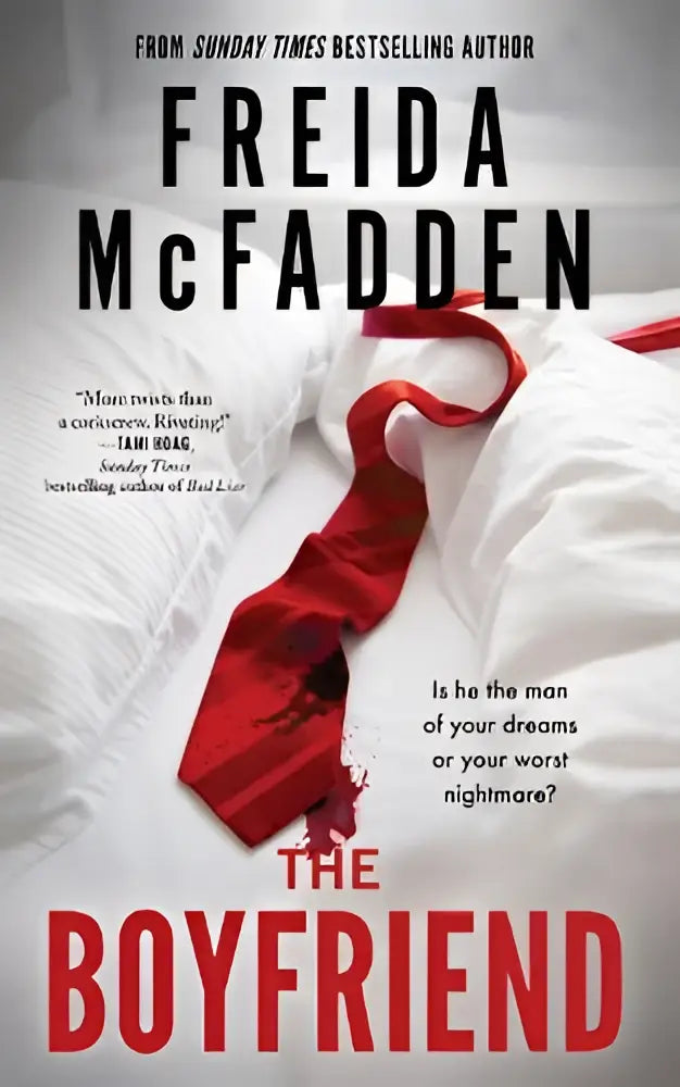 Een levendige rode zijden stropdas diagonaal op een witte stofachtergrond times bestseller van de sunday times