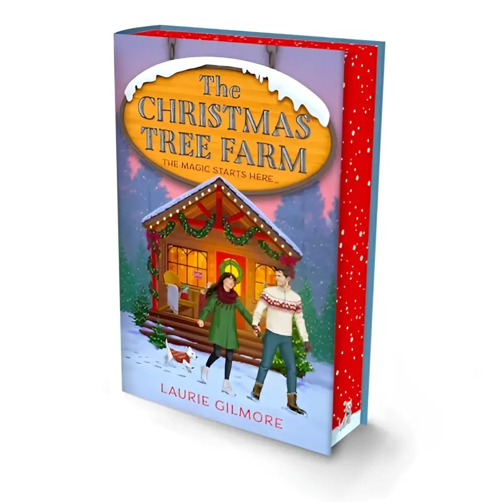The christmas tree farm deluxe edition part 3 book with festive cover featuring a cozy log cabin and snowy holiday scene
