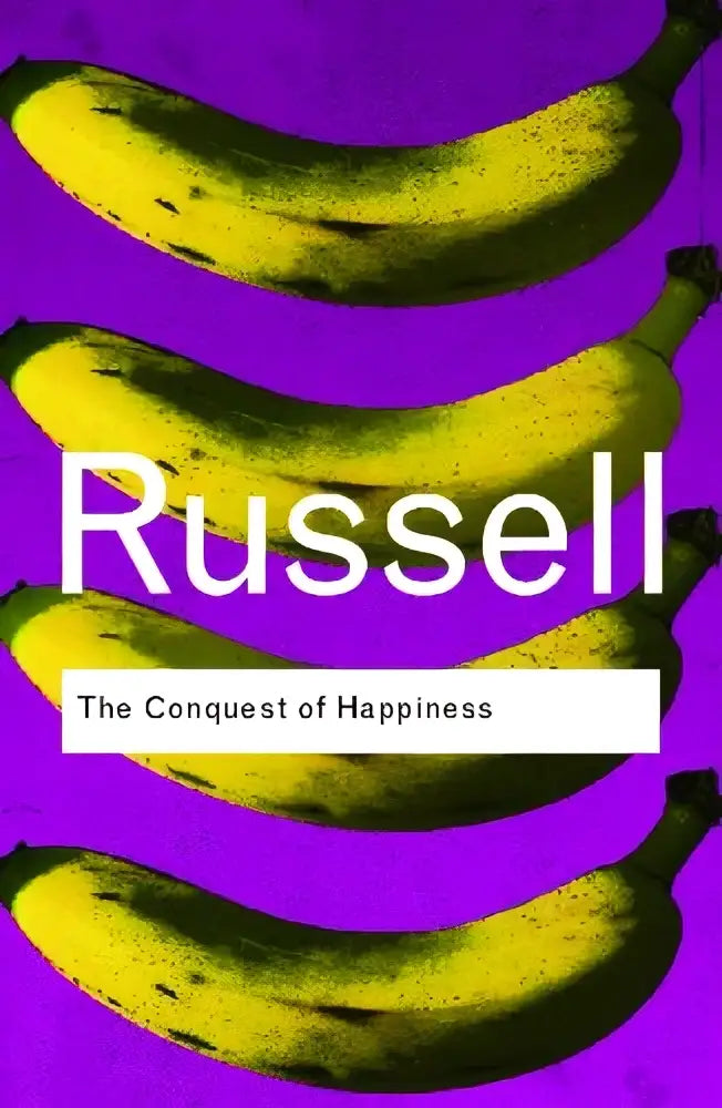 The conquest of happiness boek met opvallende gele bananen op paarse achtergrond en witte typografie russell
