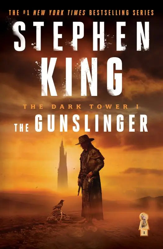 The dark tower i the gunslinger boekomslag met een silhouet van een geweerdrager in donker leer tegen oranje woestijnlucht