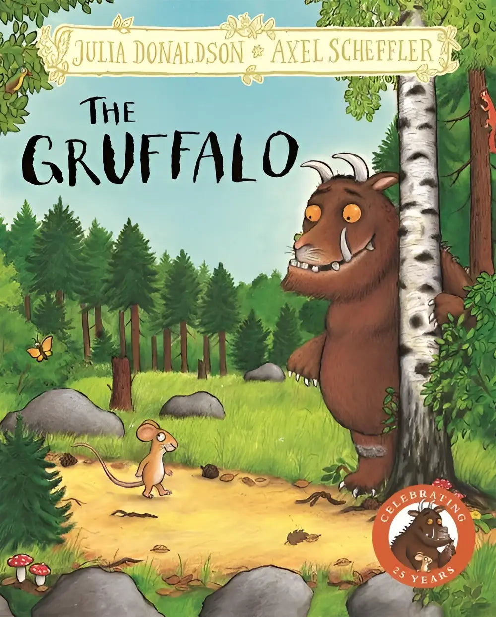 The gruffalo hardback gift edition by julia donaldson and axel scheffler shows a brown furry creature beside a birch tree