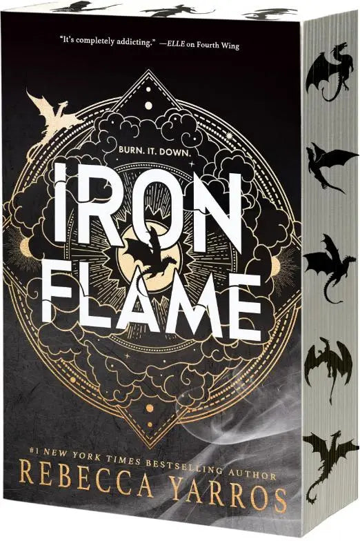 Zwart hardcover boek de iron flame met goudkleurige titel en gedetailleerd drakenmotief op de kaft