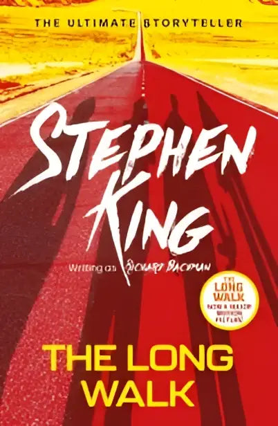 The long walk hardcover book with bold red and yellow cover featuring stephen king writing as richard bachman
