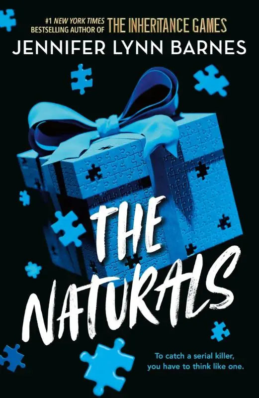 A blauw puzzelstuk geschenkdoosje met een bijpassend lint van the naturals productlijn