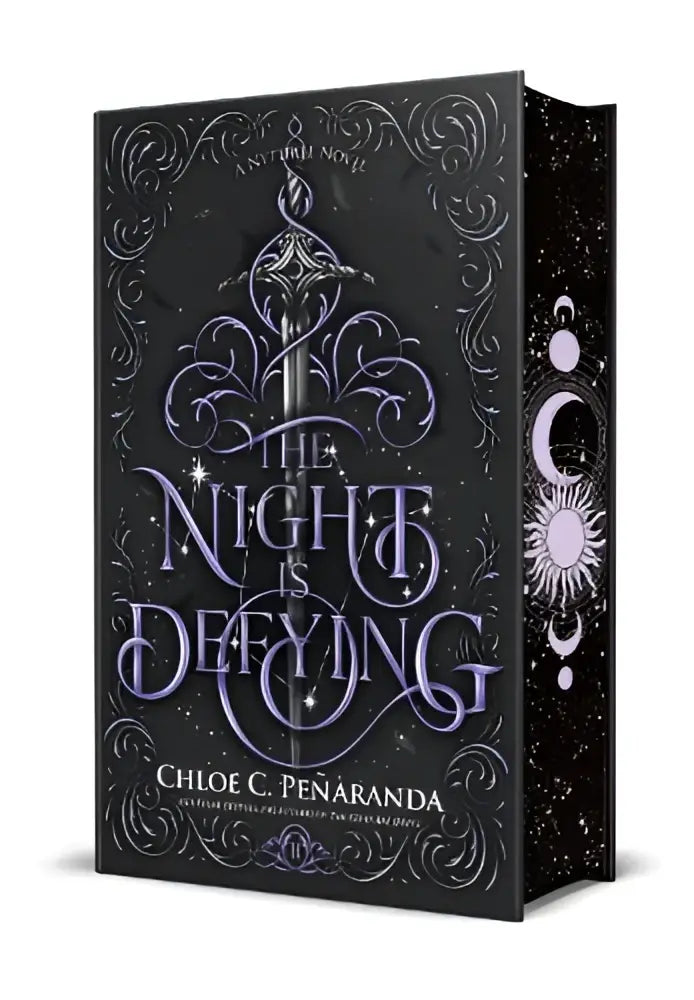 The night is defying een nytefall novel donkere hardcover met zilveren en paarse decoraties romantische fantasy boek