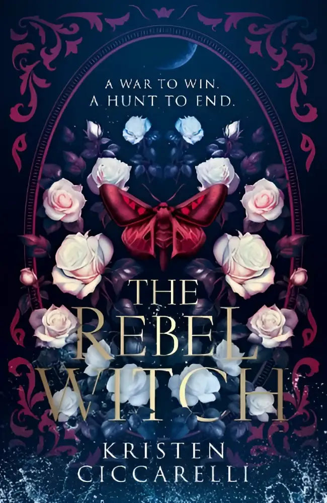 The rebel witch book cover features a crimson moth centered among white roses with a dark blue floral border