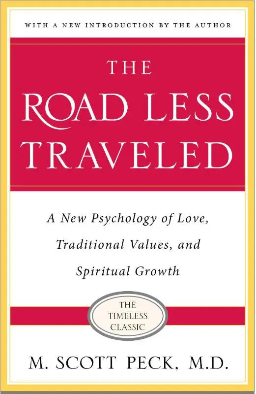 De road less traveled boekomslag heeft een rood-wit ontwerp met elegante serif typografie en een dunne gouden rand