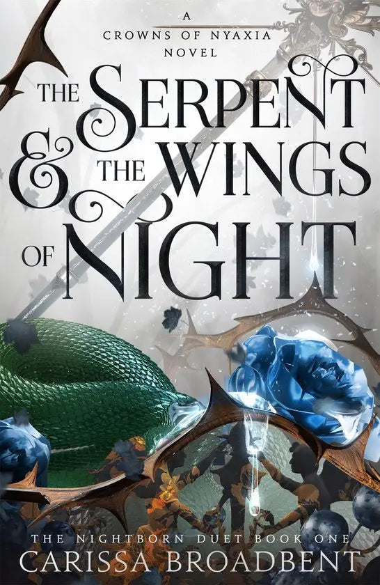 The serpent and the wings of night hardback book cover featuring a green scaled serpent and blue roses on a dark background