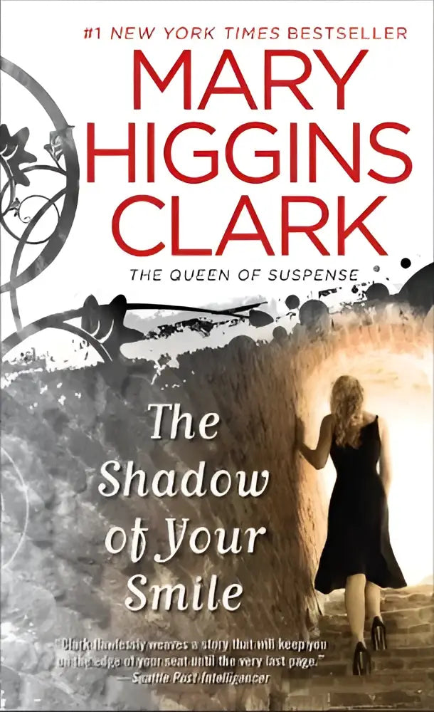 Paperbackboek the shadow of your smile van mary higgins clark met een zwart-witte omslag en vrouw bij tunnel