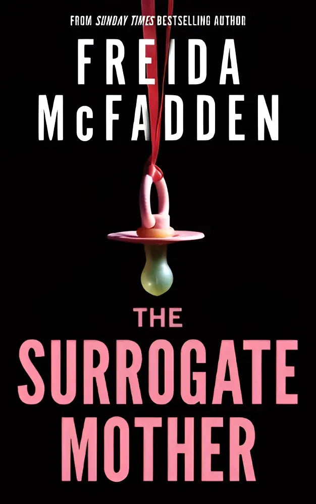 A pink pacifier with a clear nipple hanging from a red string representing the surrogate mother thriller from the housemaid books