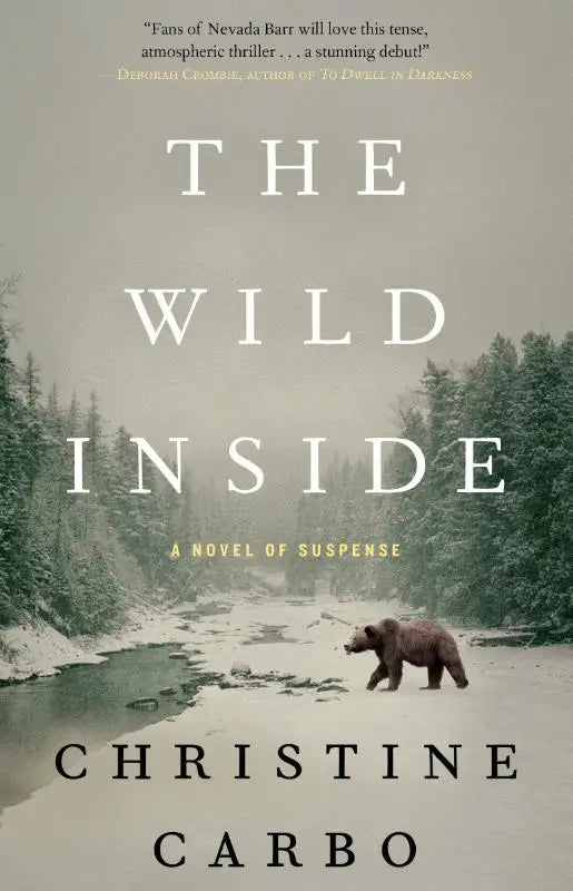 The wild inside novel of suspense featuring a brown bear walking across snow beside a river