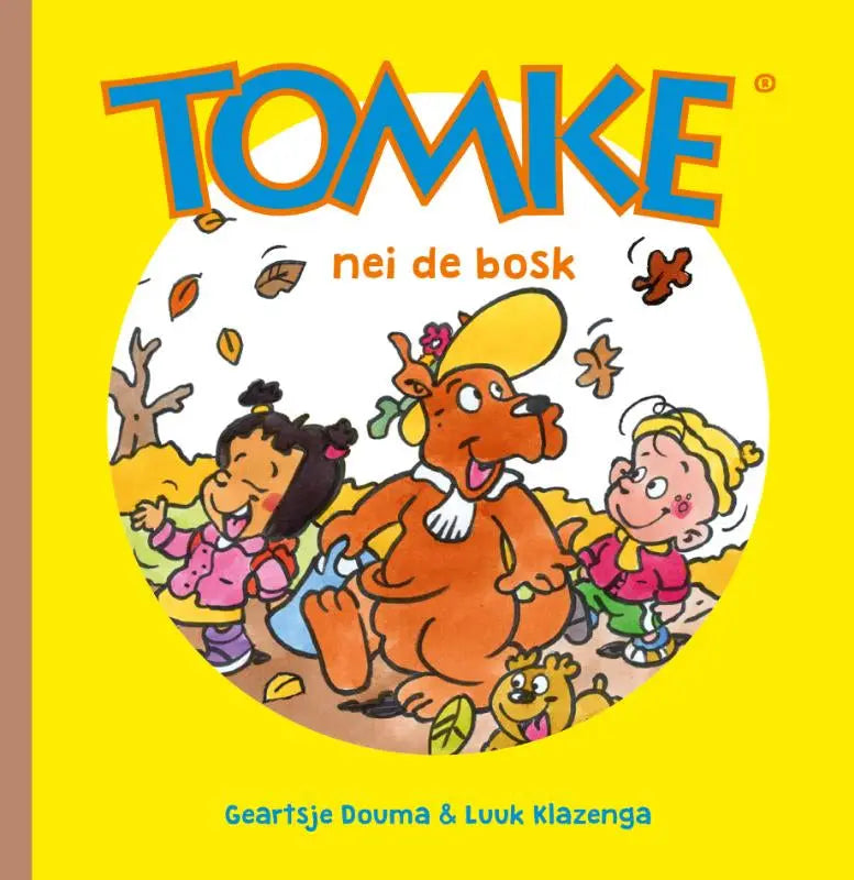 Bright yellow tomke nei de bosk children’s book cover with bold blue title and cartoon kids with dog in autumn leaves