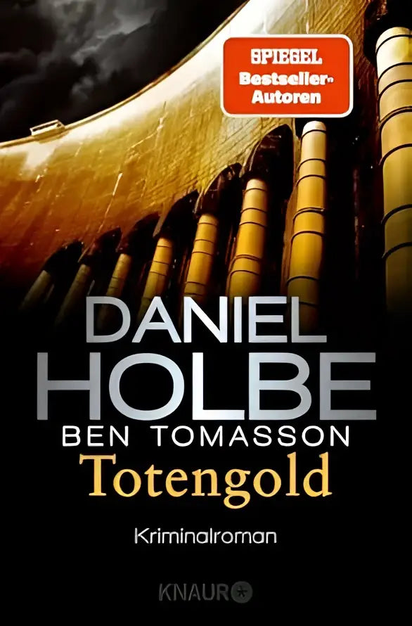 De boekcover van totengold door daniel holbe en ben tomasson toont gouden pijpen tegen een donkere hemel
