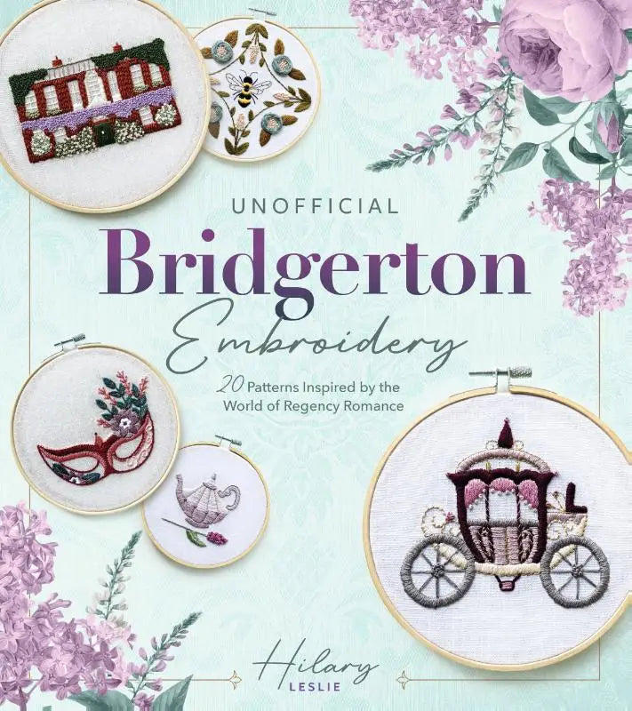 A soft lavender and cream embroidered carriage design with pink accents in a wooden hoop from unofficial bridgerton embroidery