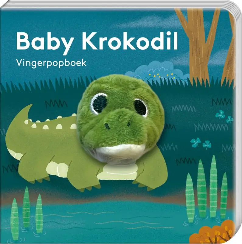 Groene pluchen vingerpop krokodil met geborduurde ogen en witte mond zichtbaar in vingerpopboekje baby krokodil voor jonge lezers