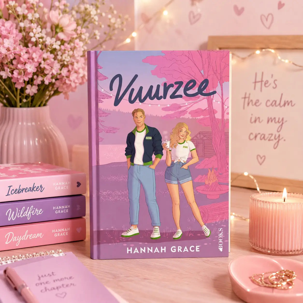 Purple hardcover boek vuurzee van hannah grace met illustratie van een koppel onder roze bomen