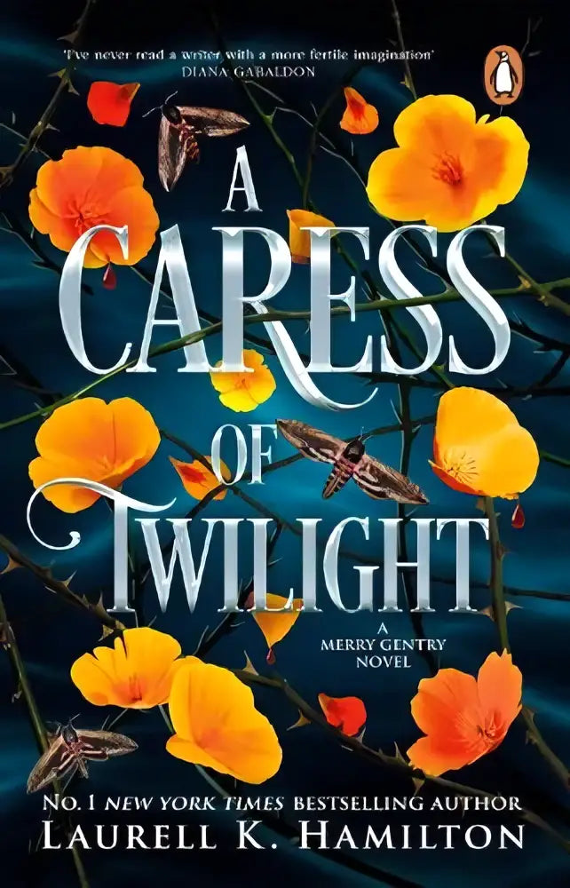 A book cover of a caress of twilight by laurell k hamilton in romantische fantasy nieuwe releases