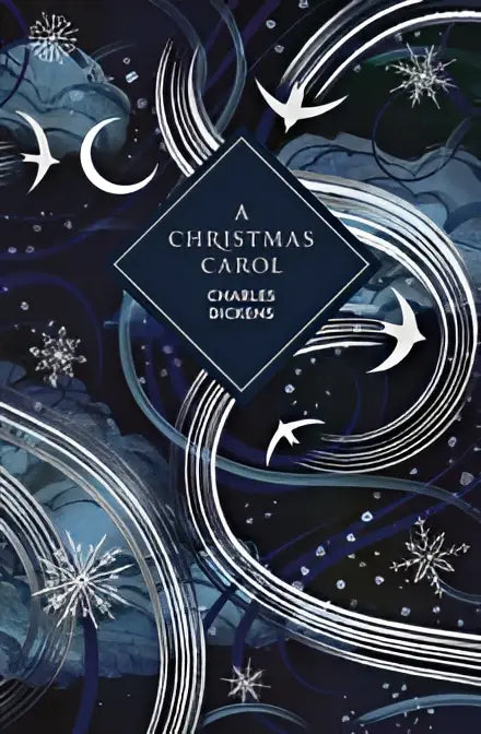 Dark blue deluxe gift edition of a christmas carol by charles dickens with white swirls snowflakes and birds design