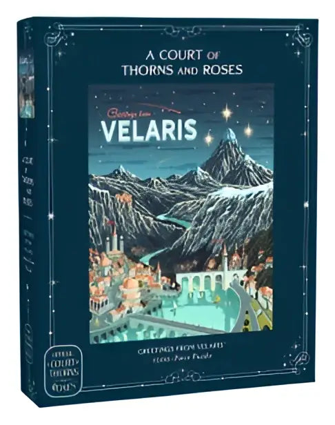 De hardcover editie van a court of thorns and roses official greetings toont velaris met sneeuwbergen en sterrenhemel