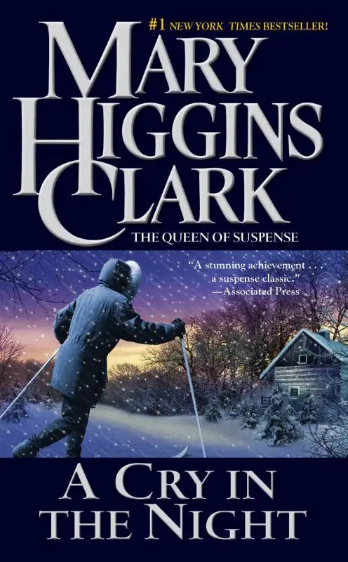 De cover van het boek a cry in the night van mary higgins clark toont een donkerblauwe achtergrond met witte en zilveren tekst