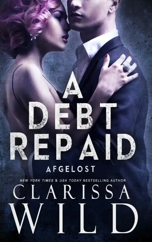 Donkerblauw en zwart boekomslag met een man in pak die een vrouw met roze haar omhelst in debt repaid dark romance