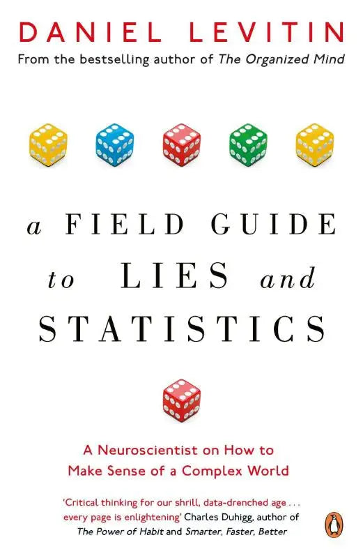 Witte hardcover van a field guide to lies and statistics door daniel levitin met kleurrijke dobbelstenen en the organized mind