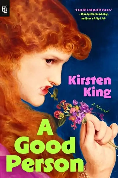 Een illustratie van een roodharige vrouw met paarse bloemen op de omslag van kirsten kings roman a good person