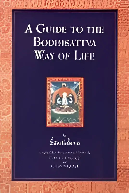 Een donkerblauw hardcoversboek met gouden letters en een sierlijke illustratie titel a guide to the bodhisattva way of life