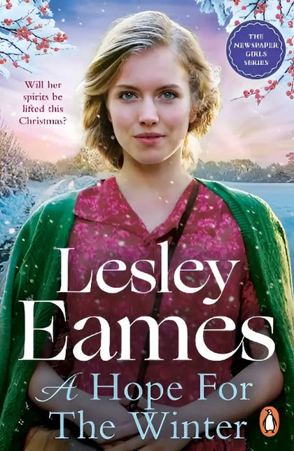 A woman wearing a pink patterned top and green cardigan stands in snow embodying hope for the winter