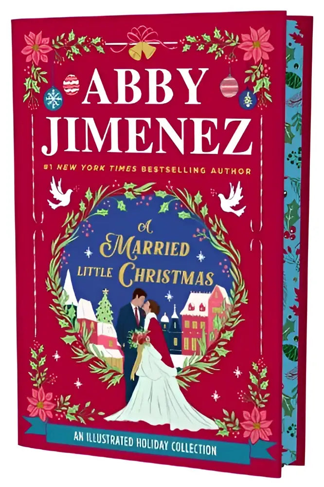 A festive rode hardcover boek getiteld a married little christmas van abby jimenez met een getekende bruid en bruidegom voor sneeuw bedekte huizen en feestelijke decoraties