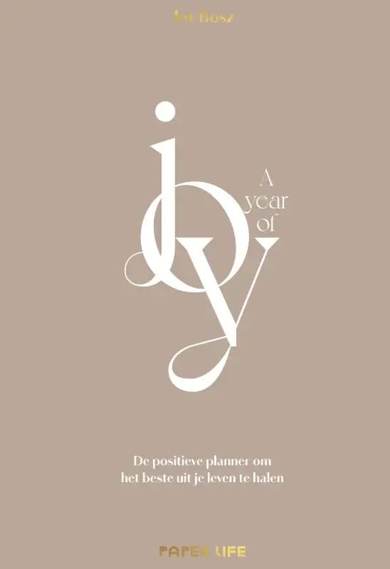 Een beige minimalistische planner cover met een gestileerd wit jby logo en tekst a year of met gouden folie accenten joy bosz positieve planner