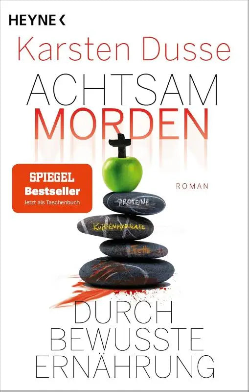 De boekcover van achtsam morden toont een stapel donkere stenen met gele tekst, een groene appel en een zwart kruis