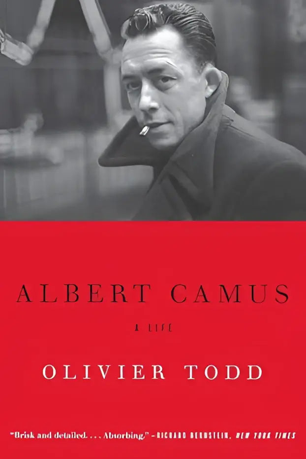 Zwarte-witportret van albert camus op een rode boekomslag voor albert camus: een leven door olivier todd