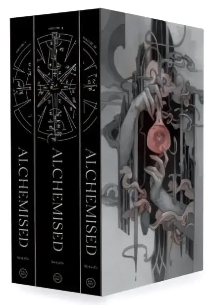 The deluxe three-volume slipcase edition alchemised features intricate black-and-white artwork with a pink rose on the cover