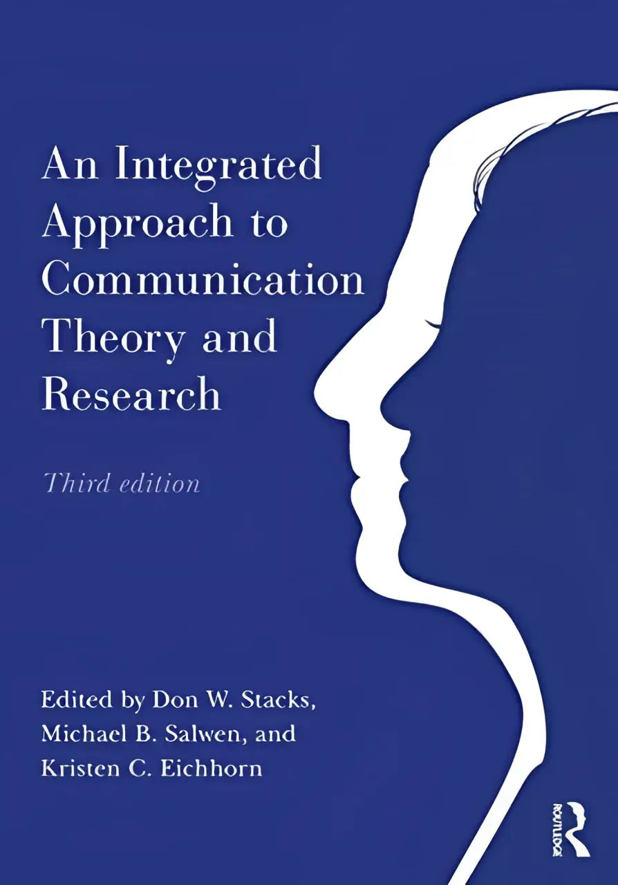Blauw boek met witte silhouet van menselijk profiel en titel an integrated approach to communication theory and research