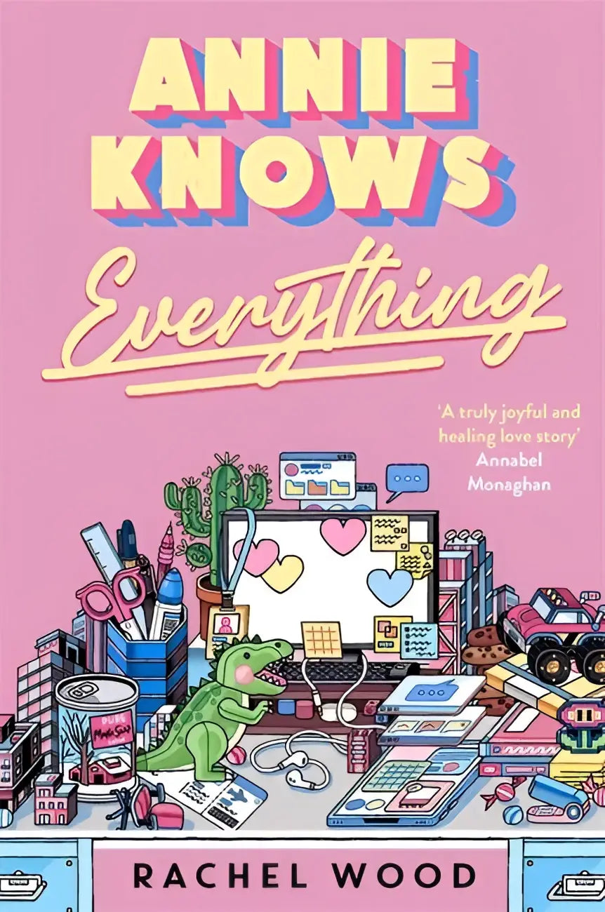 Roze boekcover van annie knows everything met een groene dino en een workplace romance die je laat lachen