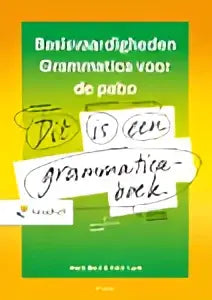 Groen leerboek basisvaardigheden grammatica voor de pabo met handgeschreven witte aantekening op de omslag door marja bout en peter lust