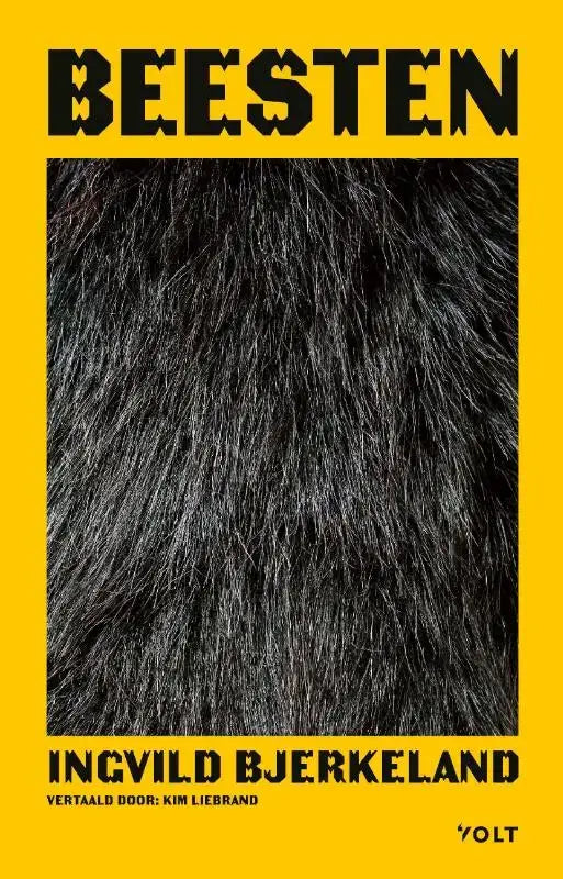 Boek beesten met zwart bont omslag en vetgedrukte zwarte tekst op felgele achtergrond