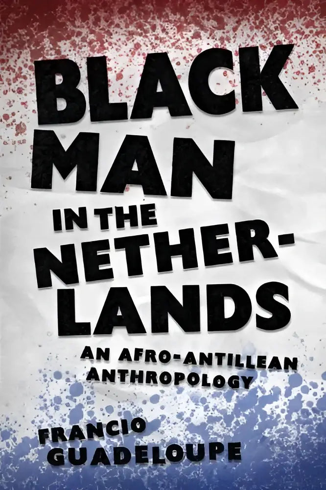Boek black man in the netherlands een afro-antilliaanse antropologie met zwarte tekst en rode en blauwe spatten