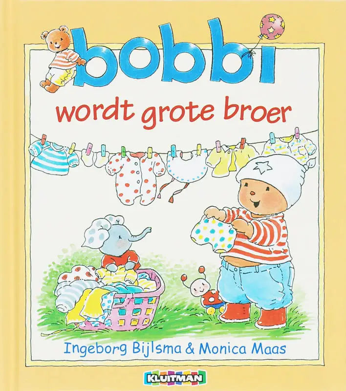De cover van het kinderboek bobbi wordt grote broer toont een vrolijke beer in rood-wit gestreept shirt met blauwe broek