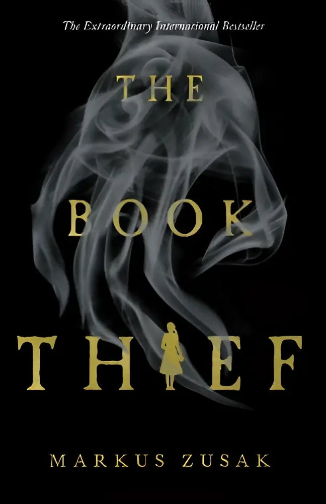 The book thief hardcover book with gold lettering on black cover featuring white smoke figure and girl silhouette
