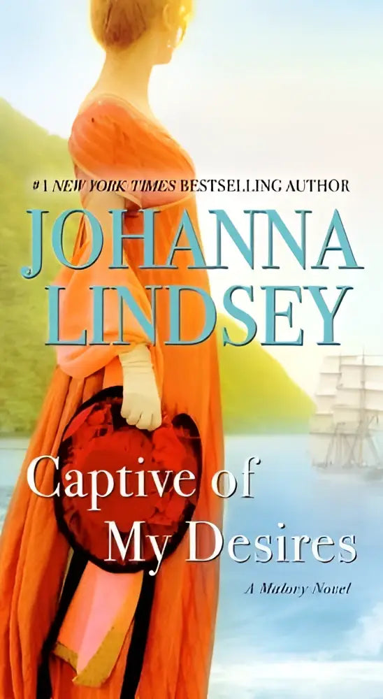 The book cover of captive of my desires shows a woman in an orange gown holding a red heart, a malory novel by johanna lindsey