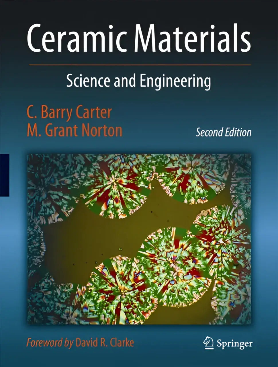 De boekcover van ceramic materials science and engineering tweede editie door c toont een wetenschappelijk en technisch boek over keramische materialen