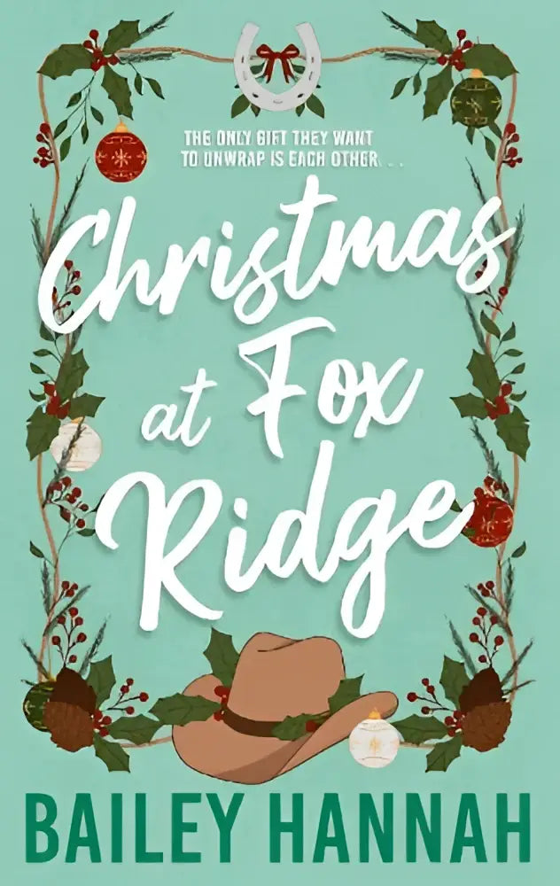 A tan cowboy hat with green holly and red berries beneath a festive wreath on christmas at fox ridge product cover