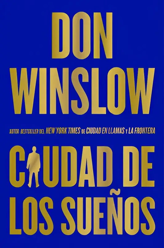 Golden-yellow tekst los sueños op een diepblauwe omslag van city of dreams door don winslow met minimalistische man en snor