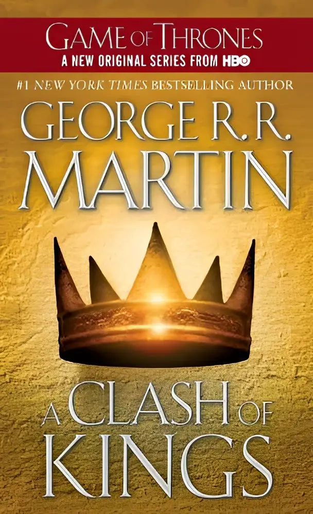 Het boek clash of kings toont een gouden kroon met fijne details en een gloeiende kern op een goudkleurige achtergrond